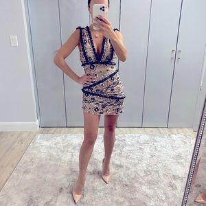 mini dress with embellished panels and fringe trim in pale pink Size 2